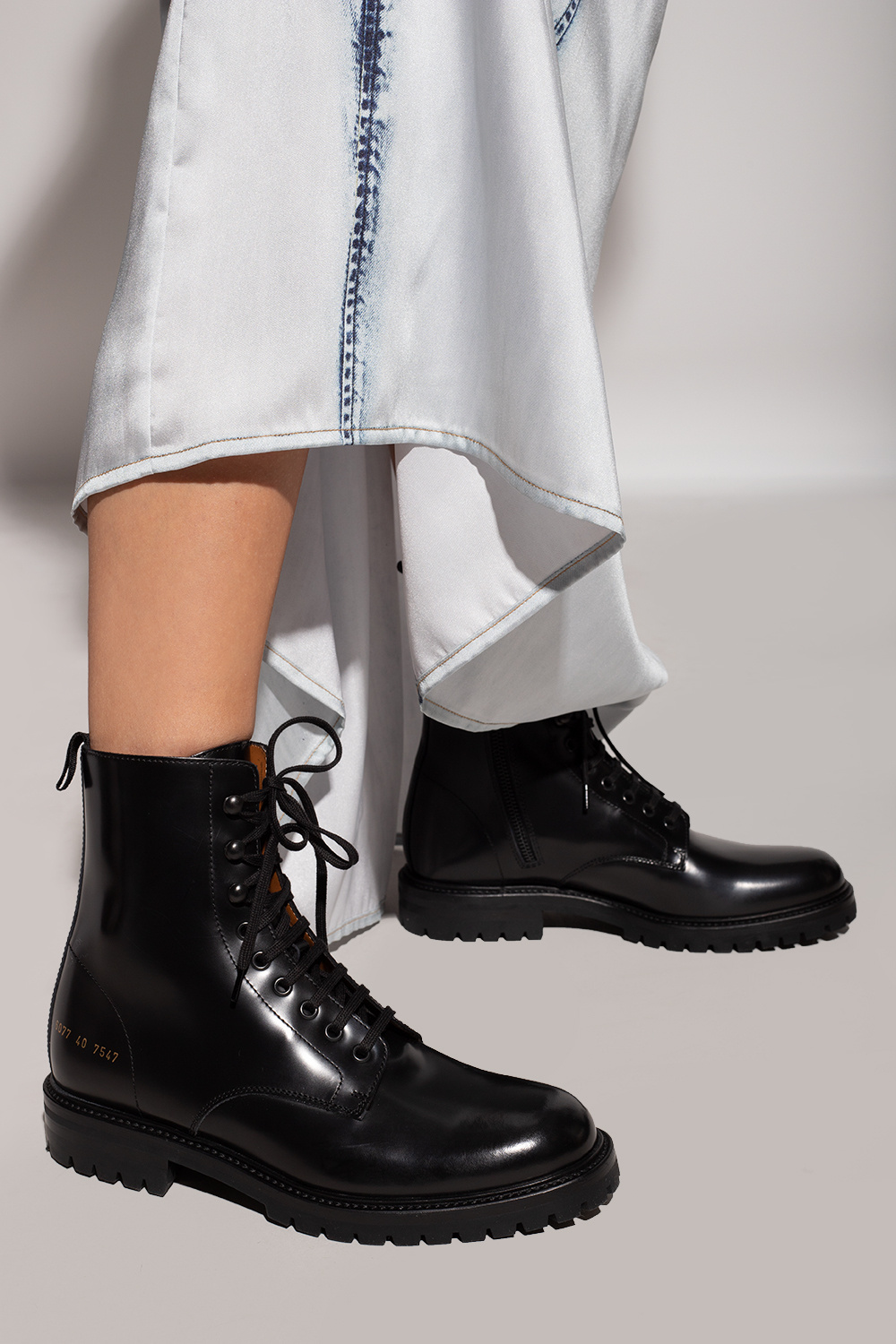 Common Projects ‘Combat’ leather ankle boots