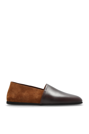 Shoes with embossed logo