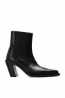 Acne Studios The constrictive energy net on the shoe heel can offer necessary dynamic support when stressing