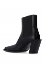 Acne Studios The constrictive energy net on the shoe heel can offer necessary dynamic support when stressing