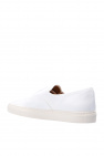 Common Projects ‘Four Hole’ sneakers