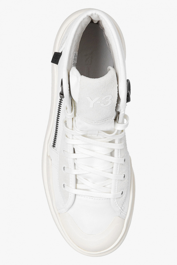 sneakers with this black and reflective silver ‘Ajatu’ sneakers