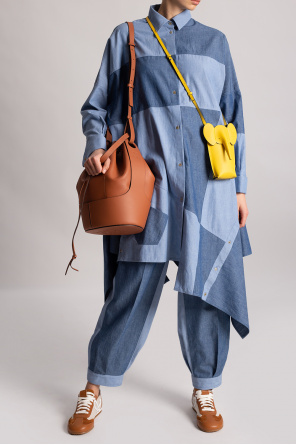 Loewe Loewe's Balloon Heels and Bag Boots Take Fall 2022 Fashion On A Surreal Twist
