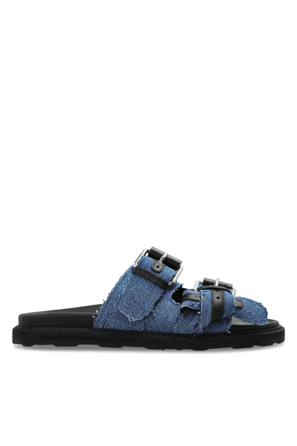 Denim slides with a 'vintage' effect od Moschino