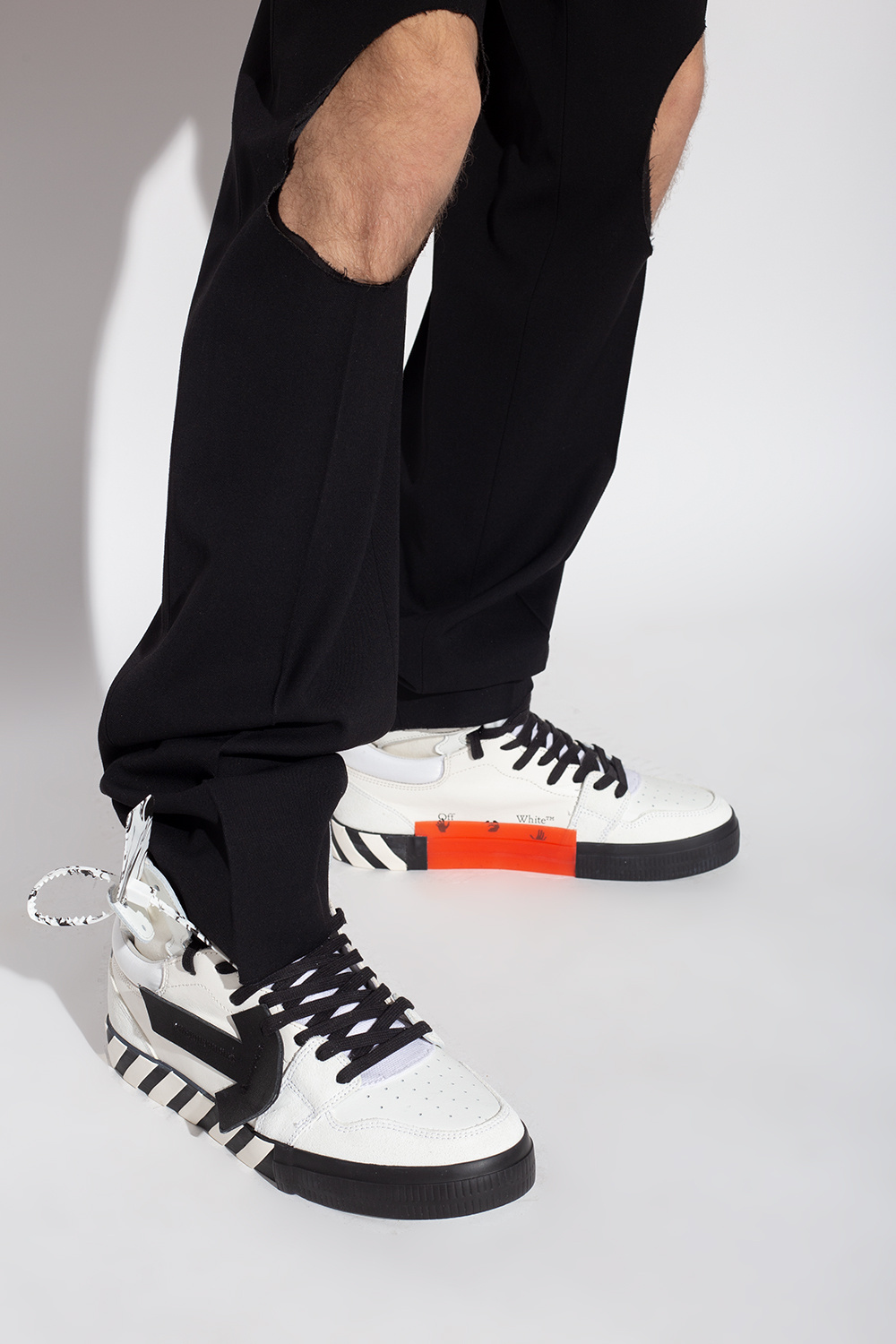 off white vulcanized high top sneakers