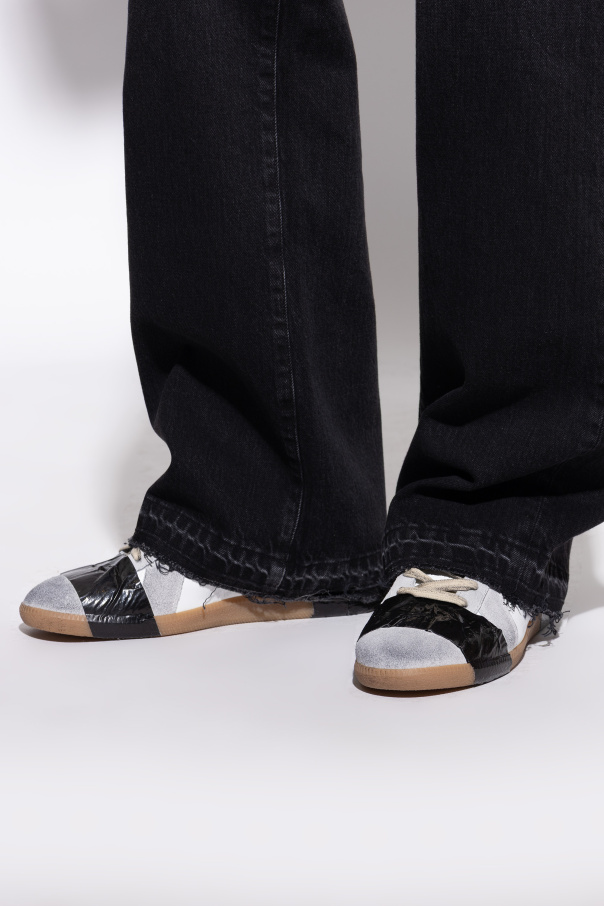 Maison Margiela Sports shoes with a vintage effect