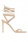 The ® Aldona sandals feature a modern thong silhouette with a square toe that elevates the look