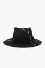 Black brown fabric tweed baker boy cap from MANOKHI featuring tweed