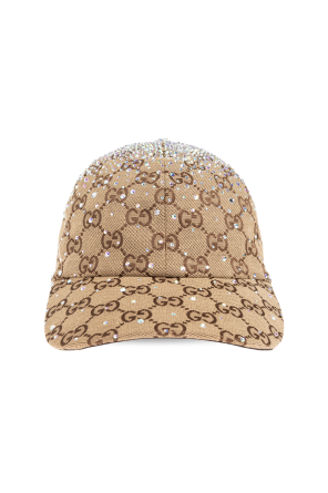 Cap with shimmering appliqués
