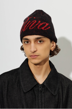 CARNE BOLLENTE Cap with decorative inscription