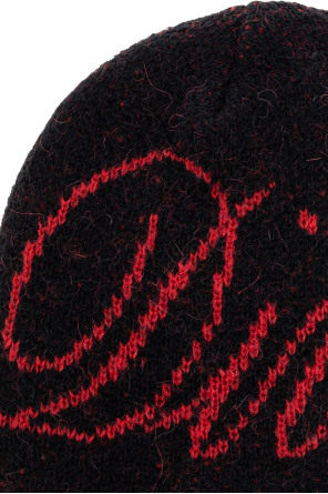 CARNE BOLLENTE Cap with decorative inscription