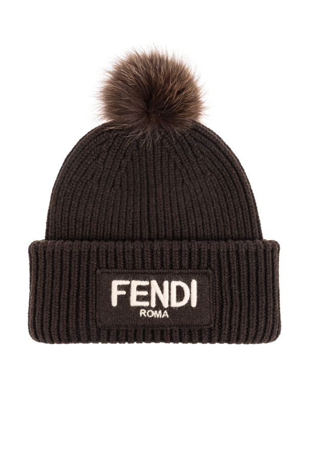 Hat with a fur pompom od Fendi