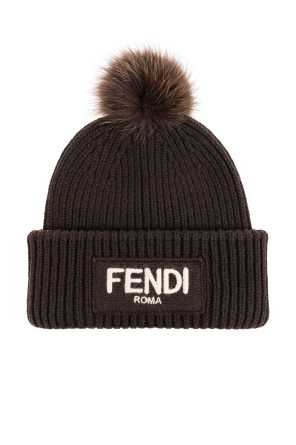 Hat with a fur pompom