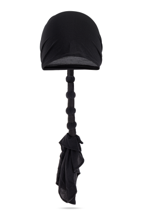 Cap with decorative fabric