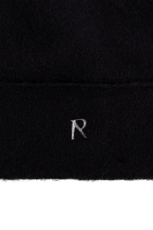 Represent Cap with a logo-shaped appliqué