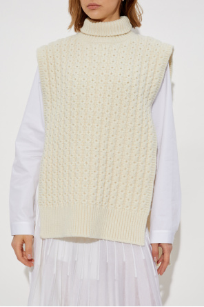 Alaïa Wool poncho with turtleneck