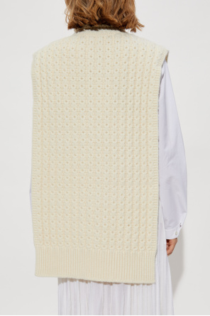 Alaïa Wool poncho with turtleneck