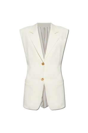 Vest with decorative draping at the back