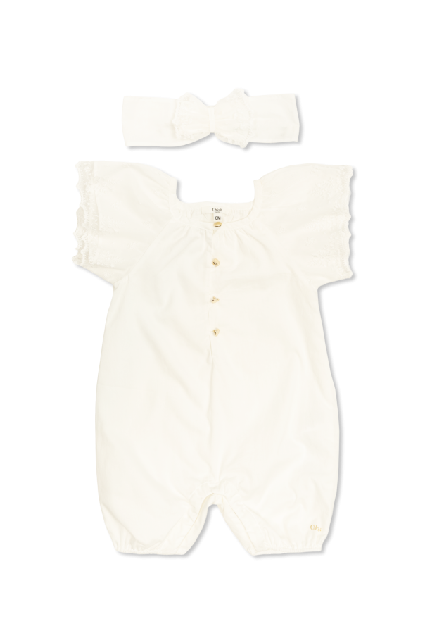 Set: baby sleepsuit, headband od Chloé Kids