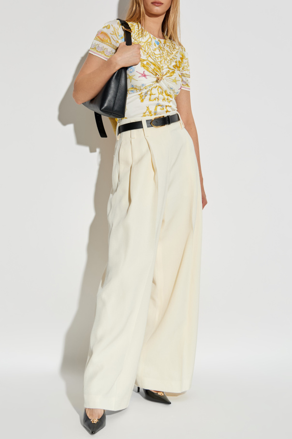 Versace Top with decorative draping and a safety pin