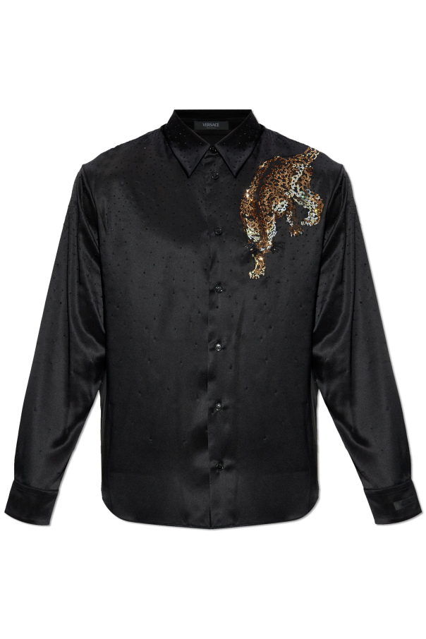 Silk shirt with shimmering appliqués od Versace