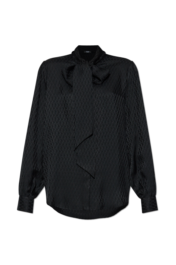 Silk shirt with decorative tie at the neckline od Versace