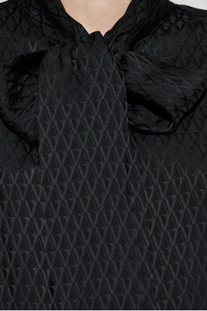 Versace Blusa de seda con lazo decorativo en el escote
