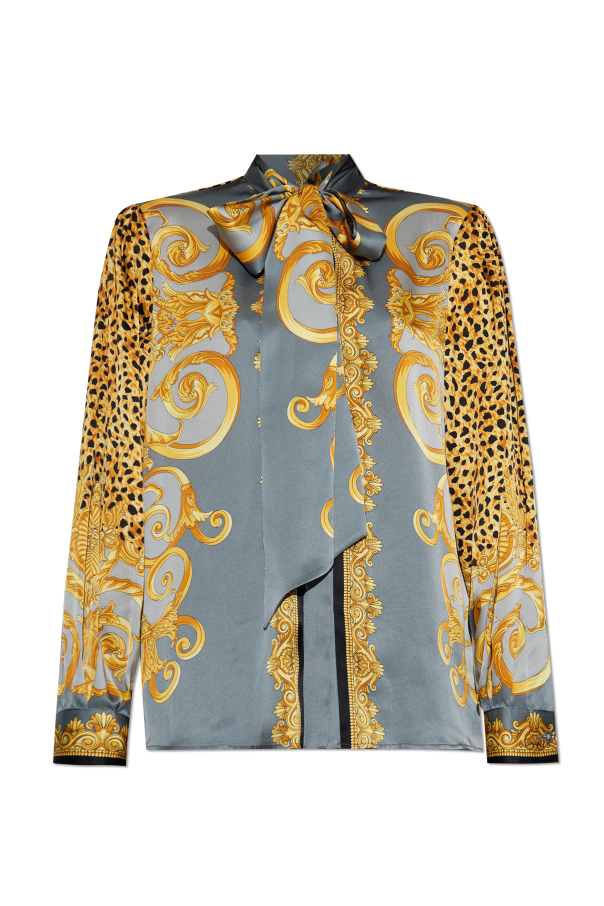 Silk shirt with decorative tie at the neckline od Versace