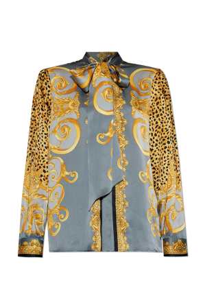 Silk shirt with decorative tie at the neckline