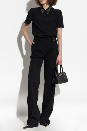 Top with applications on the collar od Versace
