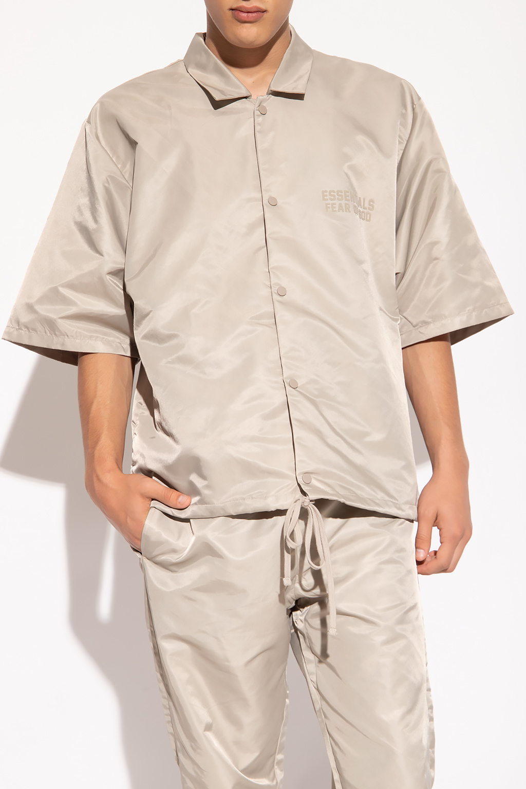 Fear Of God Essentials shirt port with logo