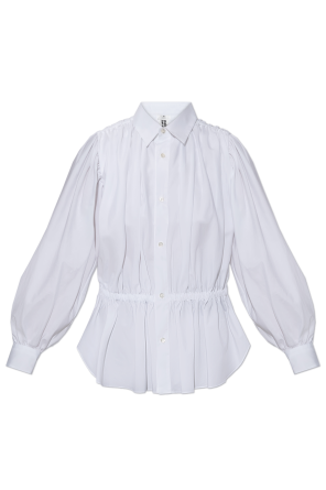 Shirt with decorative drapings