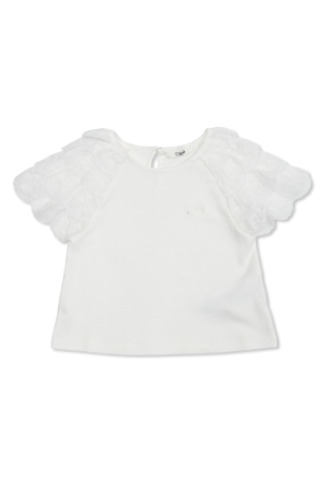 Top with embroidery on the sleeves