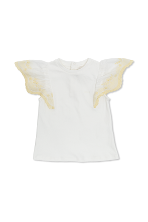 Top with embroidery on the sleeves