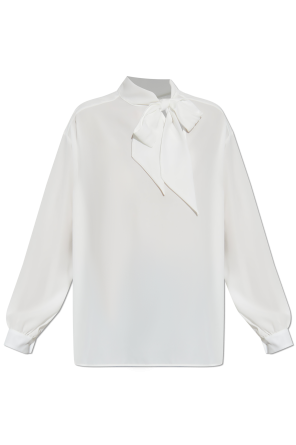 Top with decorative tie at the neckline