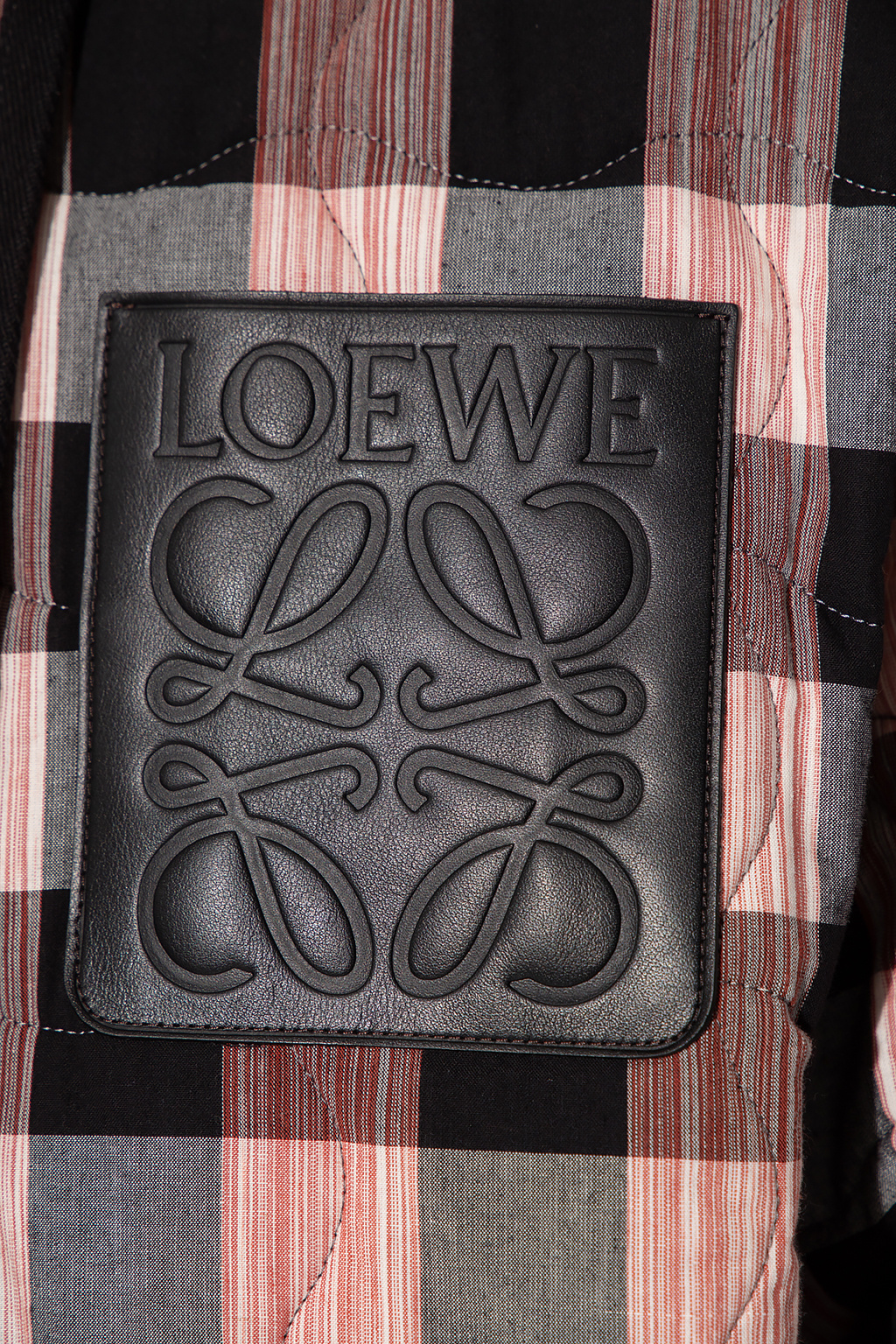 Loewe loewe bucket handbag in black leather and beige raphia