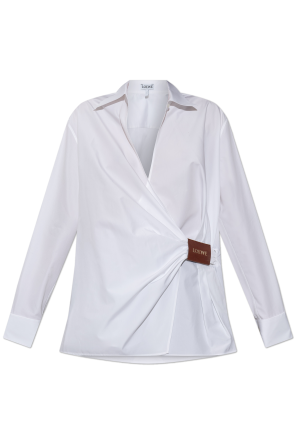 Shirt with leather logo patch