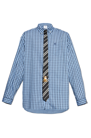Shirt with an attached tie