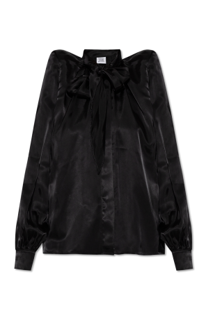 Shirt with shoulder pads