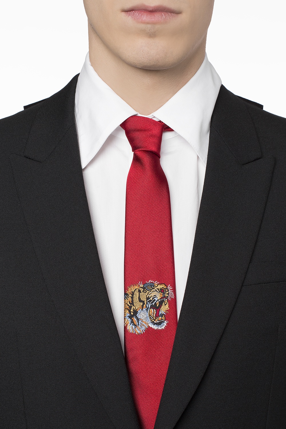 Man with Gucci Belt with Tiger Head and Red and Black Checkered