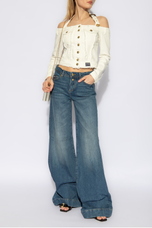 Jeansowa kurtka z odkrytymi ramionami od Versace Jeans Couture