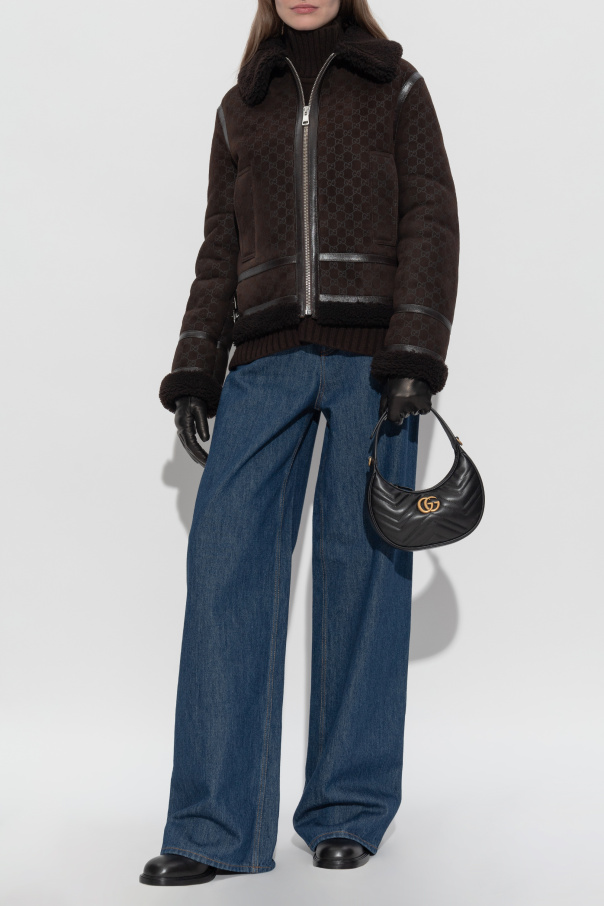 Gucci Abrigo de piel vuelta con patrón "GG"