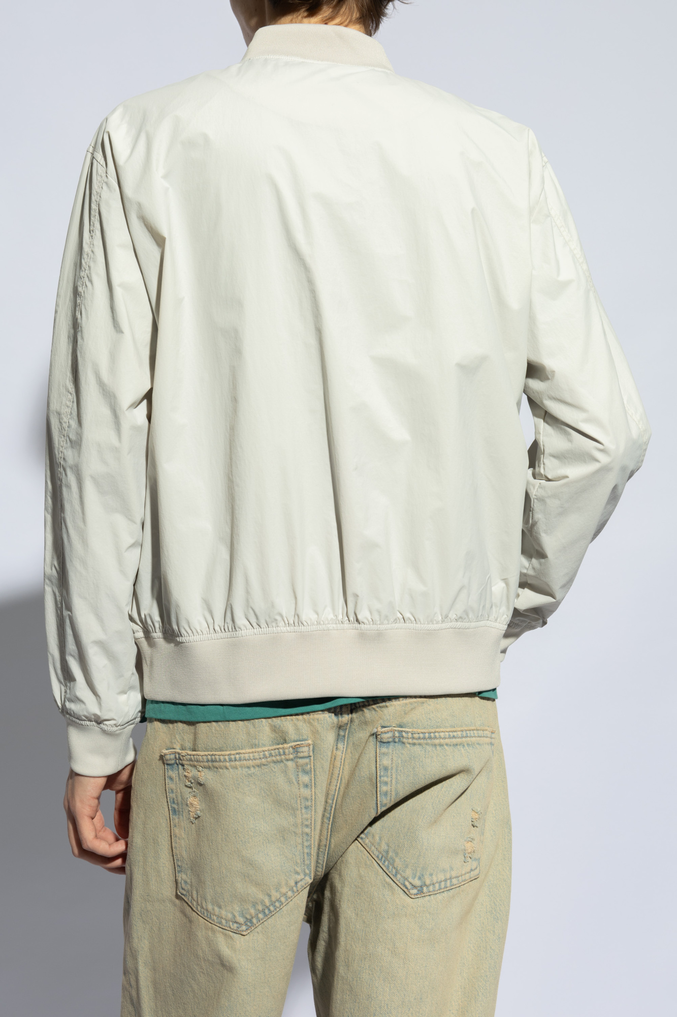 This liner shirt from Japanese streetwear brand ‘Myles’ bomber jacket