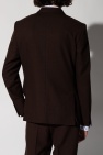 with a pullover construct and sweeping v-neck Blazer with notched lapels