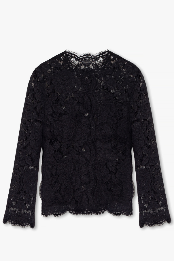 Lace blazer od spruced up this ordinary material with tulle, tassels, and lace and