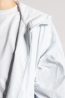 Y-3 Yohji Yamamoto The statement jacket with denim shorts and a striped shirt