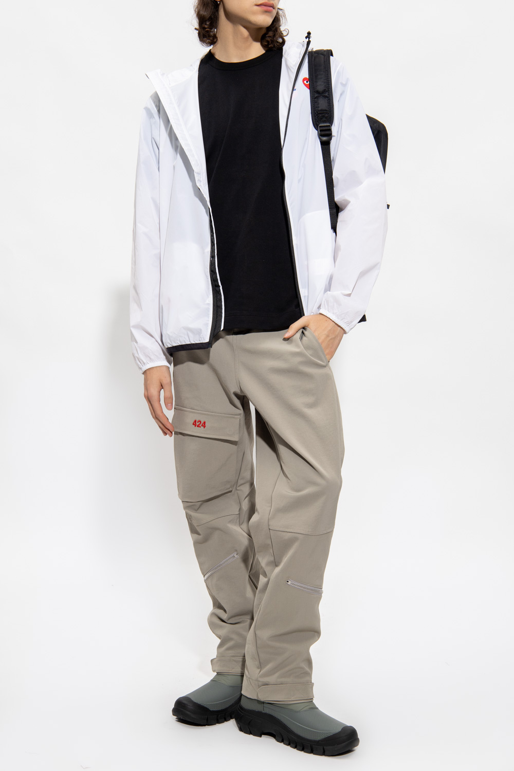 This timeless stand collar swing jacket is a Comme Des Garçons Play x K-Way