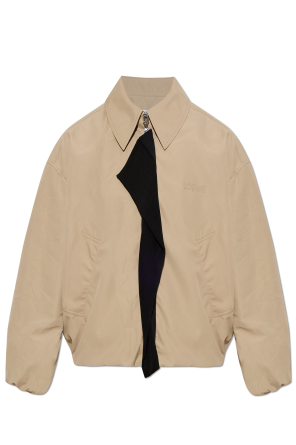 Jacket with decorative insert by the zipper