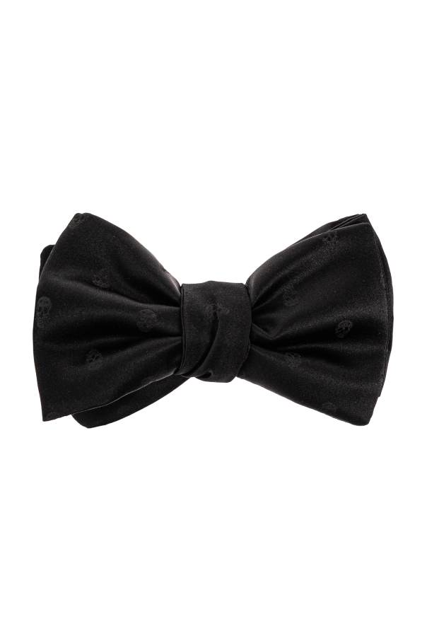 Silk bow tie with a distinctive skull motif od Alexander McQueen