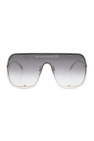 The Petit Soupcon Sunglasses features a plastic frame and metal hardware